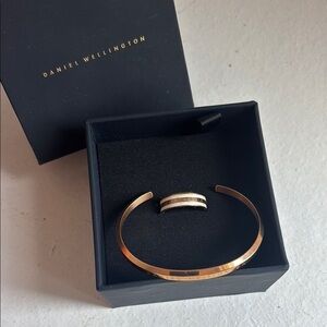 Daniel Wellington Gold Cuff Bracelet and ring